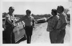 Don Devereux at right with MCOP organizer Adela Serrano negotiating strike line rules of the day with Maricopa County sheriff's deputies at the site of a prolonged work-stoppage at an onion farm in the fall of 1977. (Photographer unknown.)